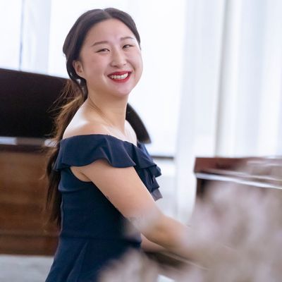 Portrait of Olga Zarichna, the practice mentor, smiling warmly.